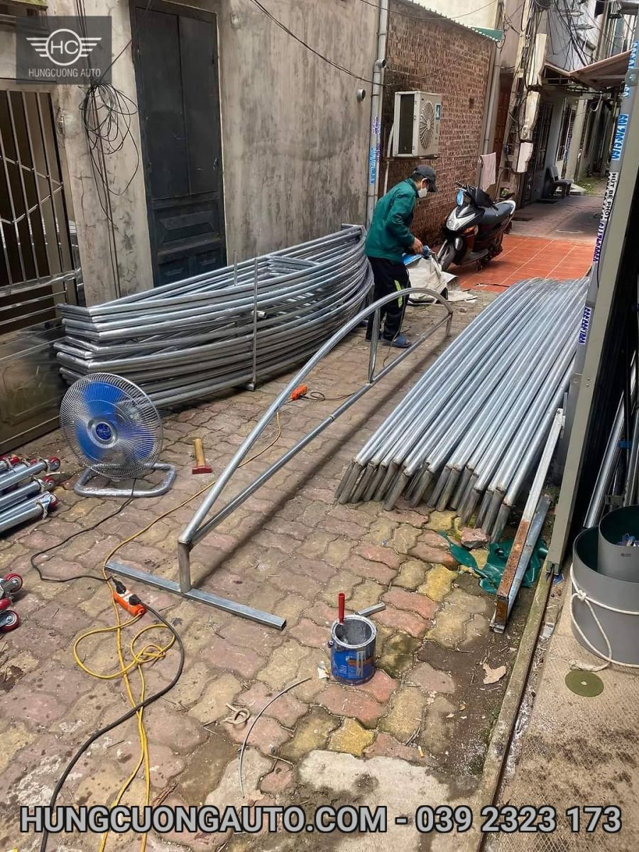 Metal frame sections being fabricated inside a workshop