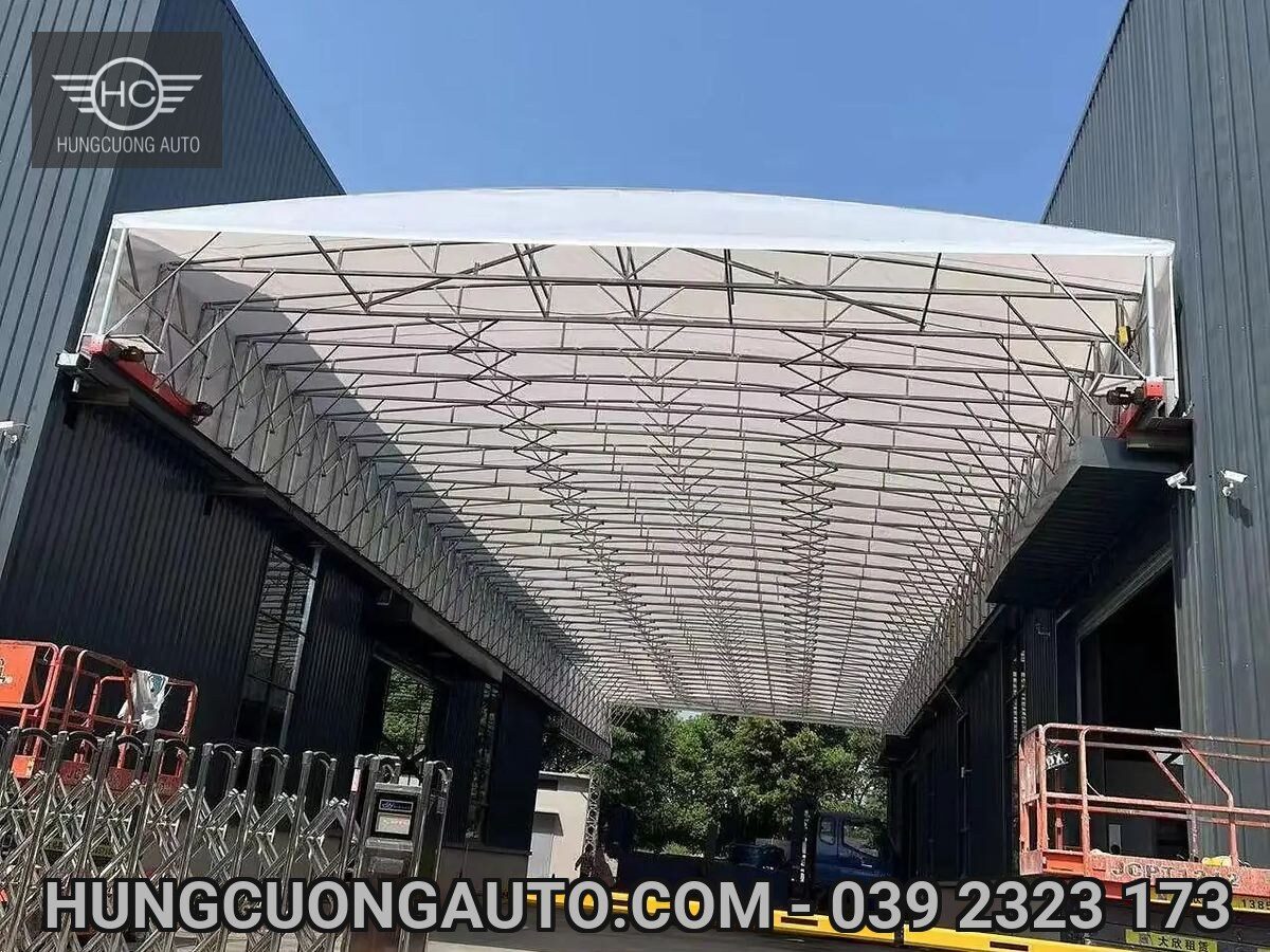 White truss canopy above a passageway